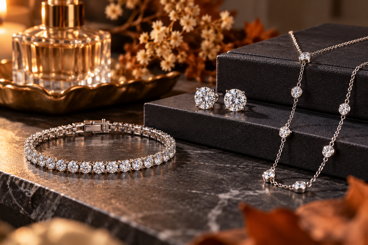 Elegant moissanite jewelry featuring sterling silver necklaces, sparkling stud earrings, and a tennis bracelet for the October 2026 Jewelry Shopping Guide.