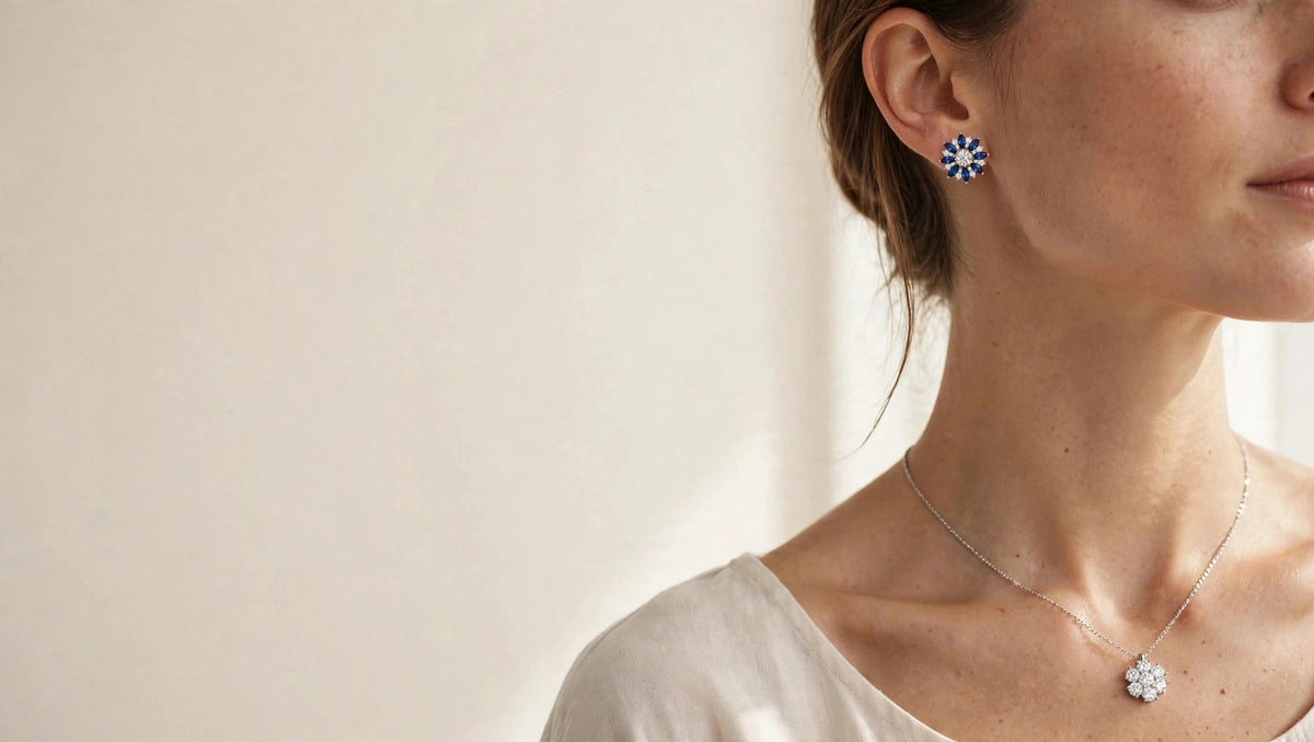 Model wearing LEONREN Forget-Me-Not blue halo moissanite stud earrings and a moissanite flower pendant necklace in S925 sterling silver